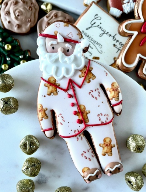 Pierniczek lukrowany Mikołaj w piżamie w ciastki Pierniczek lukrowany Mikołaj w piżamie w ciastki