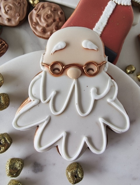 Pierniczek lukrowany świąteczny głowa Mikołaja Pierniczek lukrowany świąteczny głowa Mikołaja